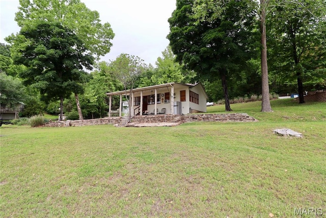 980 Laura Hufferd Rd, Roach, MO 65787 - view of grassy yard with a porch