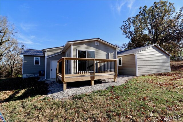 261 Buffalo Linn Creek Rd, Macks Creek, MO 65786 - rear view of property with a wooden deck