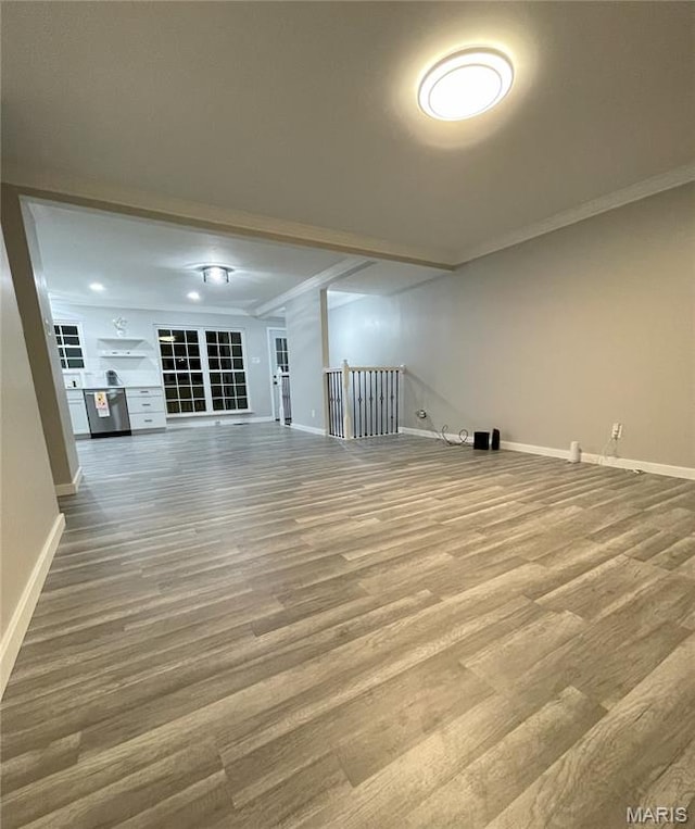 19 Saint David Dr, Saint Peters, MO 63376 - unfurnished living room featuring wood finished floors and crown molding