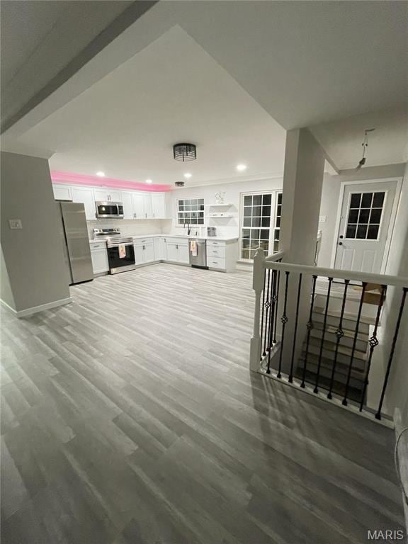 19 Saint David Dr, Saint Peters, MO 63376 - unfurnished living room with wood finished floors and recessed lighting