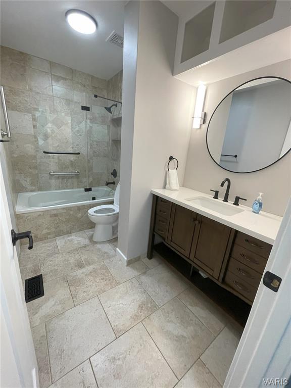 19 Saint David Dr, Saint Peters, MO 63376 - bathroom featuring tiled shower / bath combo and vanity