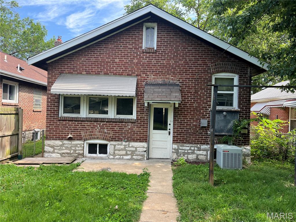 6730 Hancock Ave, Saint Louis, MO 63139 - view of front facade featuring brick siding