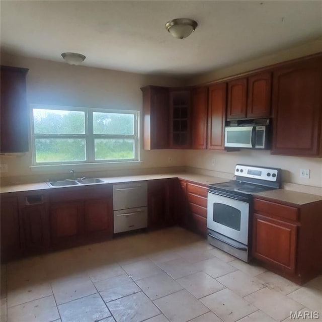 13801 Country Meadow Ct, Wright City, MO 63390 - kitchen with stainless steel appliances, healthy amount of natural light, and light countertops