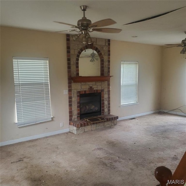 13801 Country Meadow Ct, Wright City, MO 63390 - unfurnished living room with a ceiling fan, carpet flooring, and a brick fireplace