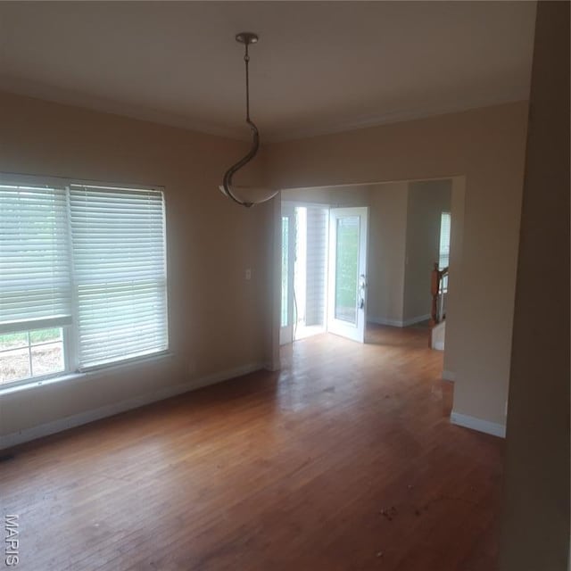 13801 Country Meadow Ct, Wright City, MO 63390 - empty room with baseboards and wood finished floors