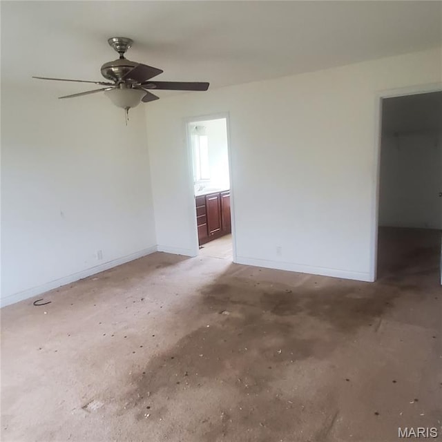 13801 Country Meadow Ct, Wright City, MO 63390 - unfurnished room with unfinished concrete floors and a ceiling fan
