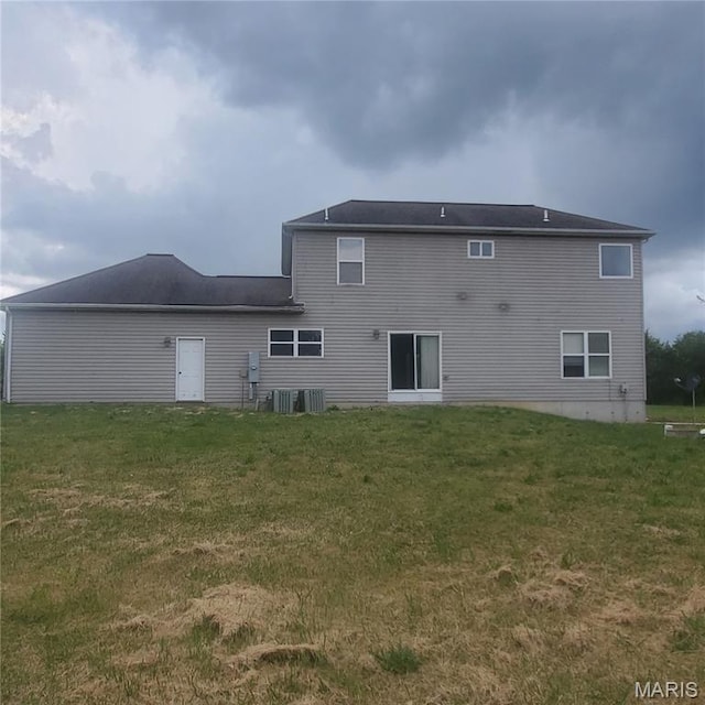13801 Country Meadow Ct, Wright City, MO 63390 - rear view of property featuring a yard