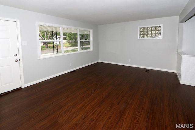 1100 Ozment Dr, Florissant, MO 63033 - unfurnished room with baseboards and wood finished floors
