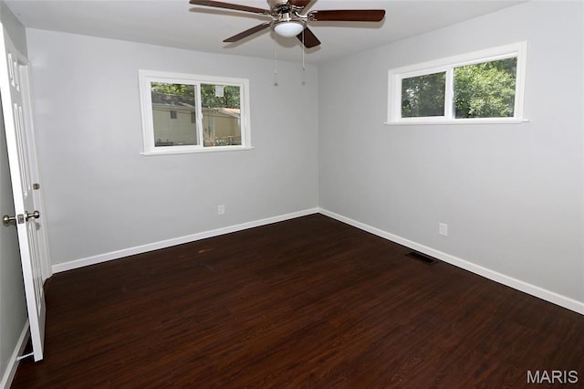 1100 Ozment Dr, Florissant, MO 63033 - empty room with a ceiling fan and wood finished floors