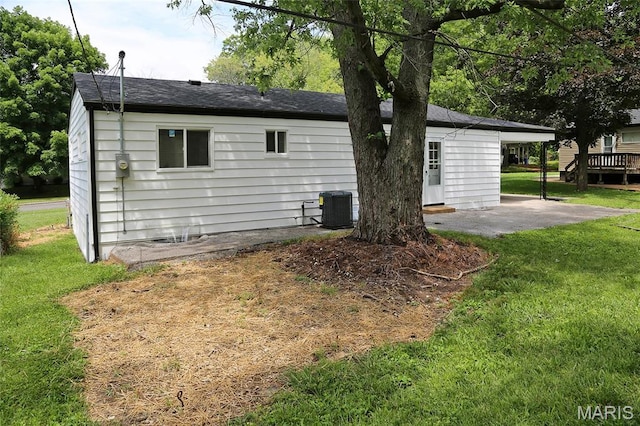 1100 Ozment Dr, Florissant, MO 63033 - view of side of property with a lawn and a patio