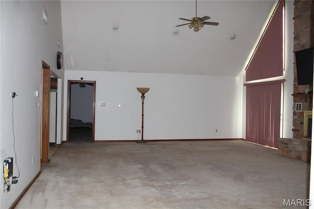 904 Keith St, Kennett, MO 63857 - additional living space featuring high vaulted ceiling, a ceiling fan, carpet flooring, and a stone fireplace