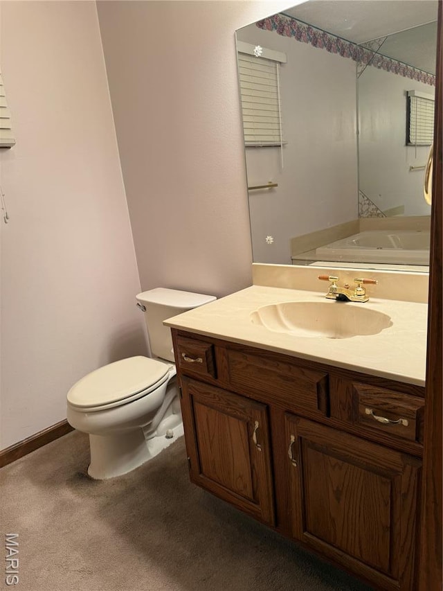 904 Keith St, Kennett, MO 63857 - bathroom featuring vanity and toilet