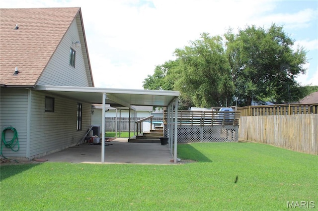 904 Keith St, Kennett, MO 63857 - view of yard featuring a carport