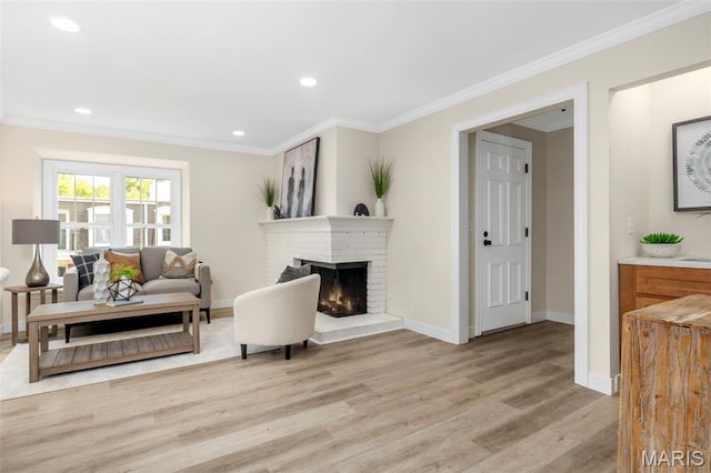 115 E Bodley Ave Unit A6, Kirkwood, MO 63122 - living room with light wood-style floors, a fireplace, ornamental molding, and recessed lighting