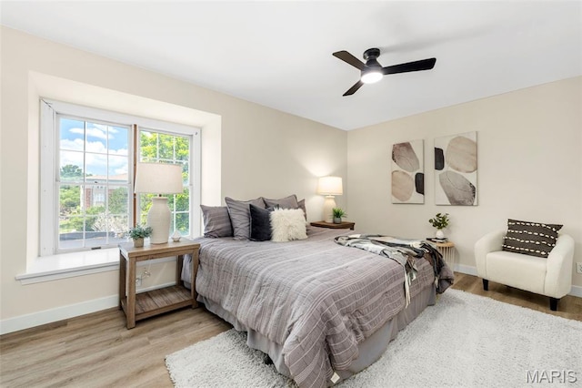 115 E Bodley Ave Unit A6, Kirkwood, MO 63122 - bedroom with wood finished floors and ceiling fan