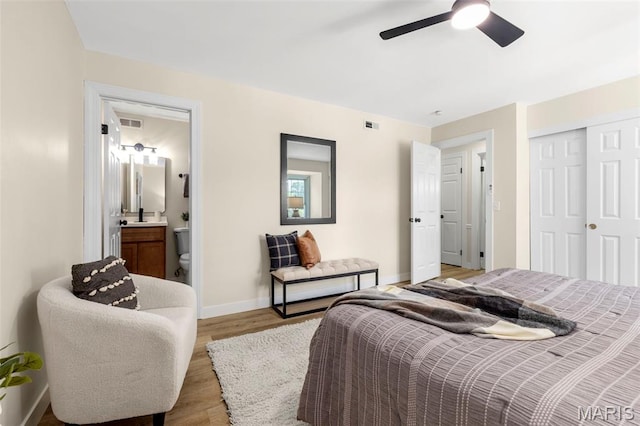 115 E Bodley Ave Unit A6, Kirkwood, MO 63122 - bedroom with wood finished floors, a closet, ensuite bathroom, and a ceiling fan