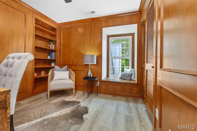 115 E Bodley Ave Unit A6, Kirkwood, MO 63122 - sitting room with wood finished floors, wooden walls, and a ceiling fan