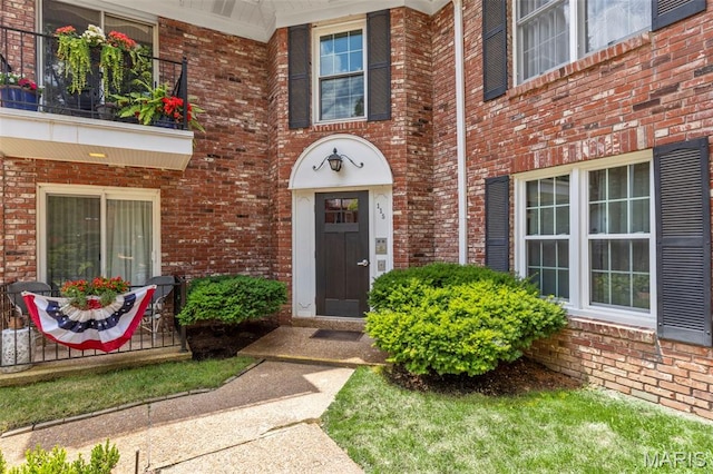 115 E Bodley Ave Unit A6, Kirkwood, MO 63122 - view of exterior entry featuring brick siding