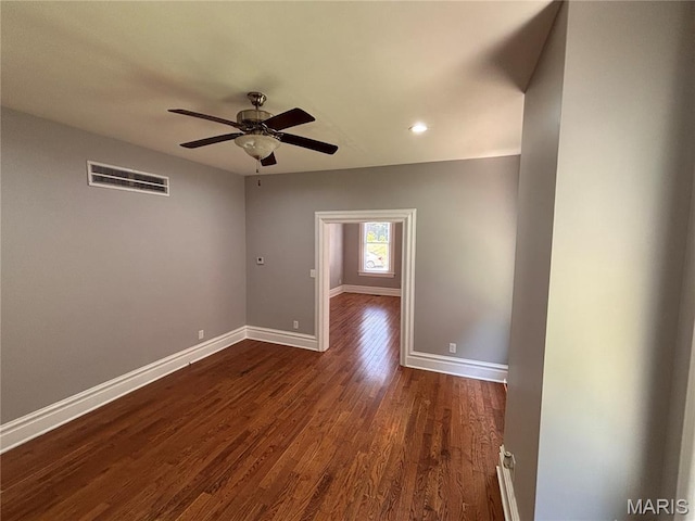 2012 Mallinckrodt St, Saint Louis, MO 63107 - spare room featuring a ceiling fan, dark wood-type flooring, and recessed lighting