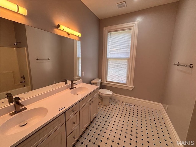 2012 Mallinckrodt St, Saint Louis, MO 63107 - bathroom with double vanity and shower / bath combination