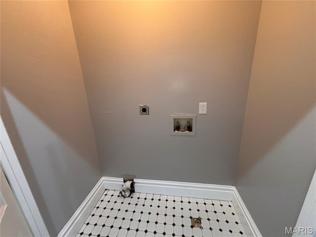 2012 Mallinckrodt St, Saint Louis, MO 63107 - laundry area featuring hookup for an electric dryer and washer hookup