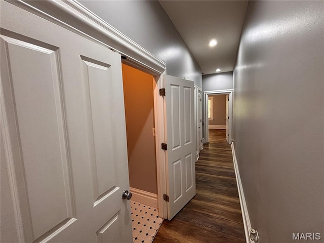 2012 Mallinckrodt St, Saint Louis, MO 63107 - hallway featuring dark wood-type flooring and recessed lighting