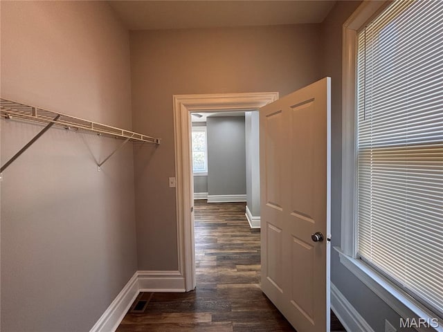 2012 Mallinckrodt St, Saint Louis, MO 63107 - walk in closet featuring dark wood finished floors