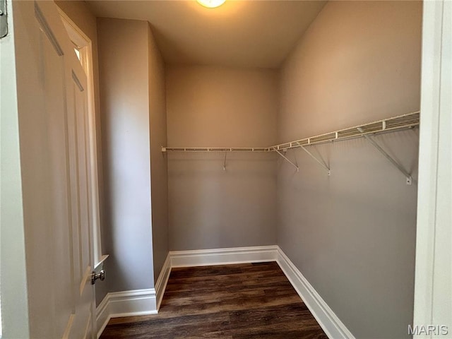 2012 Mallinckrodt St, Saint Louis, MO 63107 - spacious closet featuring dark wood-style floors