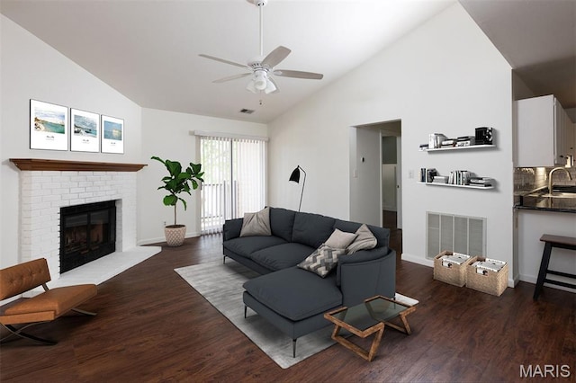 1316 Holgate Unit G6, Ballwin, MO 63021 - living area with a ceiling fan, dark wood finished floors, a fireplace, and high vaulted ceiling