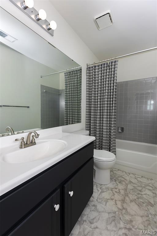 1316 Holgate Unit G6, Ballwin, MO 63021 - full bathroom featuring marble finish flooring, vanity, and shower / bathtub combination with curtain