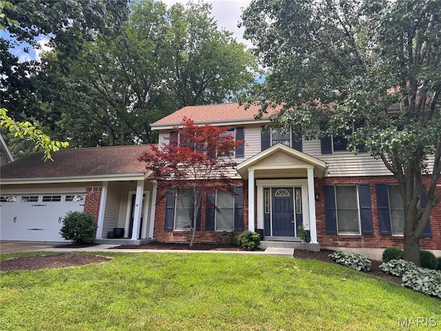 15495 Long Castle Forest Ct, Chesterfield, MO 63017 - traditional home with a garage, brick siding, a front yard, and driveway