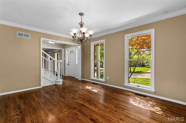 15495 Long Castle Forest Ct, Chesterfield, MO 63017 - empty room featuring a chandelier, crown molding, stairs, and wood finished floors