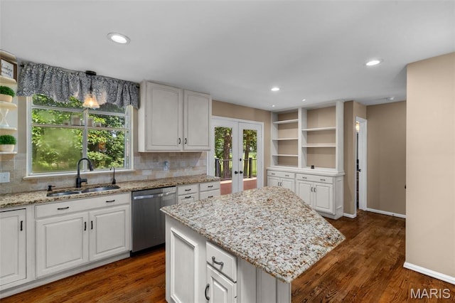 15495 Long Castle Forest Ct, Chesterfield, MO 63017 - kitchen with dishwasher, open shelves, french doors, tasteful backsplash, and recessed lighting