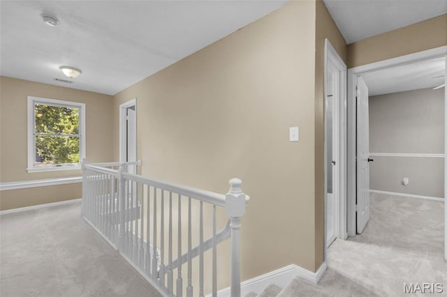 15495 Long Castle Forest Ct, Chesterfield, MO 63017 - corridor featuring an upstairs landing and carpet flooring