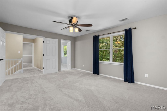 15495 Long Castle Forest Ct, Chesterfield, MO 63017 - carpeted empty room featuring ceiling fan and healthy amount of natural light