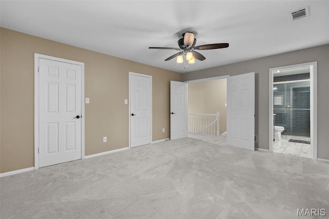 15495 Long Castle Forest Ct, Chesterfield, MO 63017 - unfurnished bedroom featuring carpet, connected bathroom, and ceiling fan