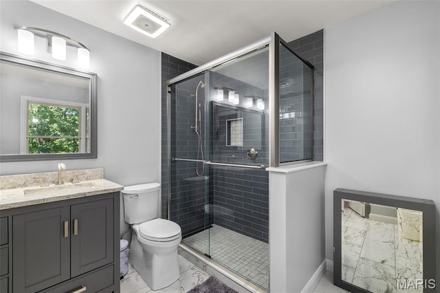 15495 Long Castle Forest Ct, Chesterfield, MO 63017 - full bathroom with marble look tile flooring, vanity, and a stall shower