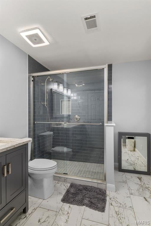 15495 Long Castle Forest Ct, Chesterfield, MO 63017 - bathroom with marble finish flooring, vanity, and a shower stall