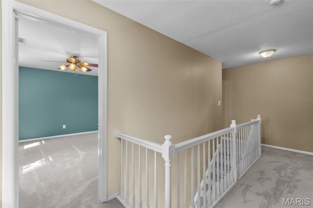 15495 Long Castle Forest Ct, Chesterfield, MO 63017 - hallway featuring carpet floors and an upstairs landing