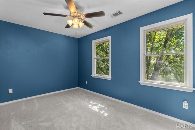 15495 Long Castle Forest Ct, Chesterfield, MO 63017 - spare room featuring a ceiling fan and carpet flooring