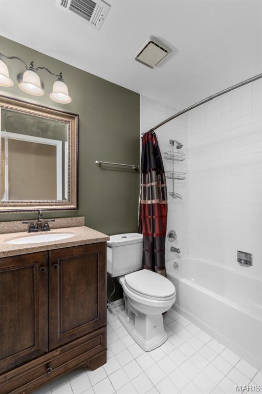 15495 Long Castle Forest Ct, Chesterfield, MO 63017 - full bath with tile patterned flooring, vanity, and shower / bathtub combination with curtain