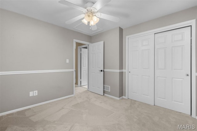 15495 Long Castle Forest Ct, Chesterfield, MO 63017 - unfurnished bedroom with carpet, a closet, and a ceiling fan