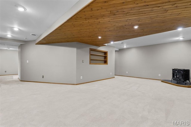 15495 Long Castle Forest Ct, Chesterfield, MO 63017 - finished below grade area featuring a wood stove, carpet, and recessed lighting