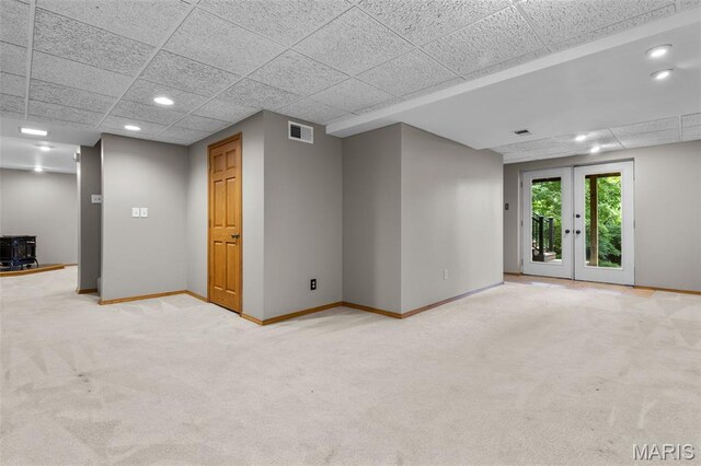 15495 Long Castle Forest Ct, Chesterfield, MO 63017 - carpeted empty room featuring recessed lighting, french doors, and a paneled ceiling