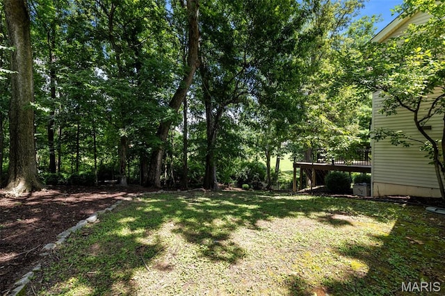 15495 Long Castle Forest Ct, Chesterfield, MO 63017 - view of green lawn featuring a wooden deck