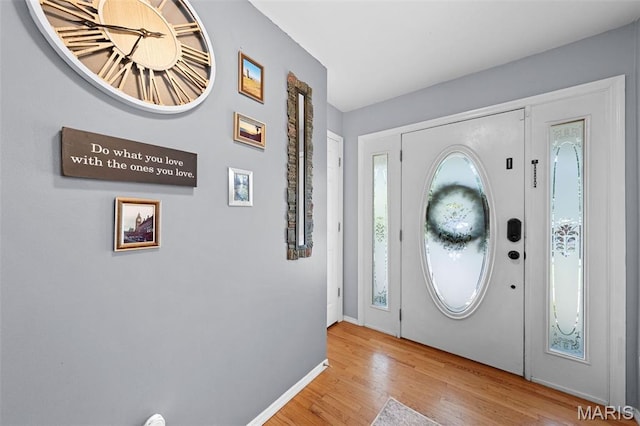 1745 Woodwind Dr, Imperial, MO 63052 - entryway with wood finished floors and baseboards
