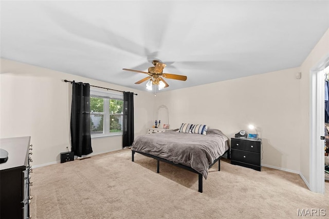1745 Woodwind Dr, Imperial, MO 63052 - carpeted bedroom with baseboards and ceiling fan