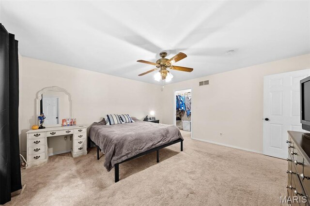 1745 Woodwind Dr, Imperial, MO 63052 - bedroom featuring light colored carpet and ceiling fan