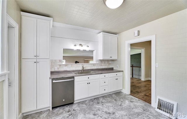 900 3rd St, Troy, MO 63379 - kitchen with dishwasher, dark countertops, white cabinets, and tasteful backsplash