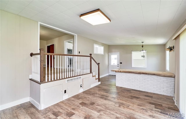 900 3rd St, Troy, MO 63379 - empty room featuring wood finished floors and stairs